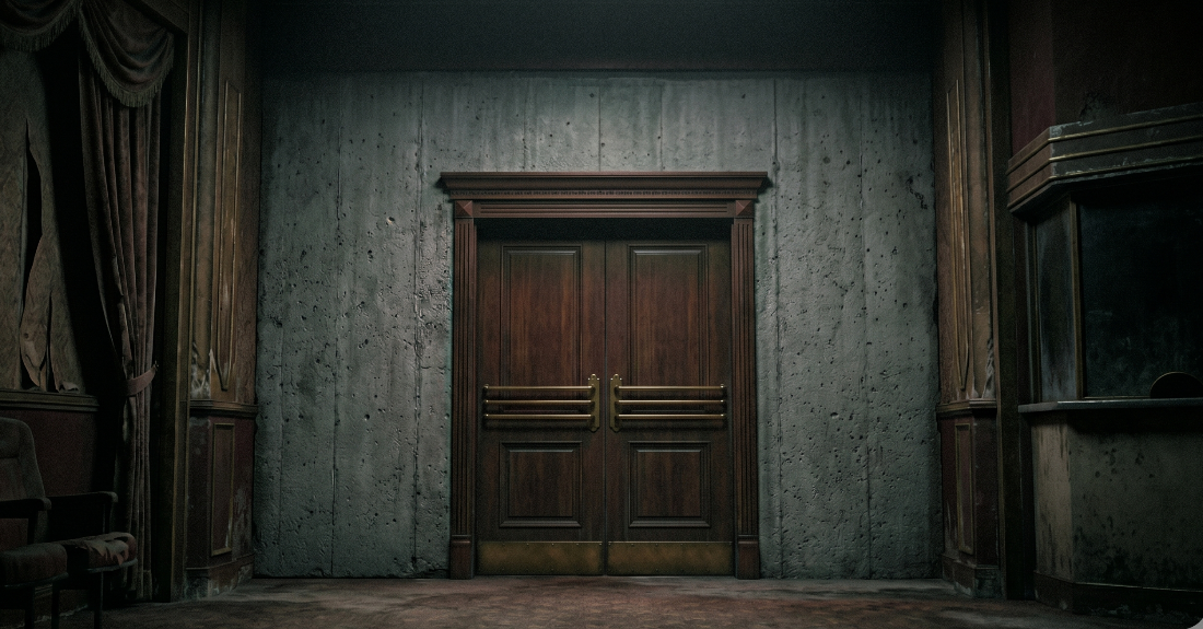 出口を塞がれた映画館という究極の密室と絶望を象徴するイメージ